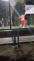 Night soccer on a floodlit Tashkent court, August 2026