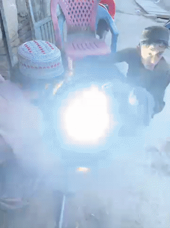 Street welders repair metal components in Kandahar workshop