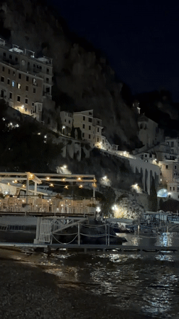 Evening coastal scenes documented in Pogerola, Italy harbor
