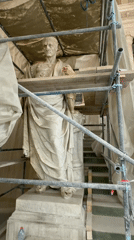 Roman statue restoration documented in ornate Brussels building