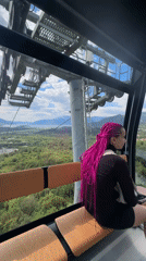 Tourists take cable car ride, browse souvenirs in Dub, Montenegro