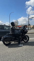 Harley rider stops at Coquitlam intersection during evening commute