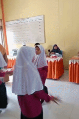 Students perform synchronized dance routines in Keudekrueng, Indonesia