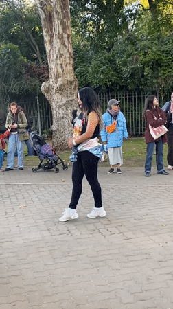 Woman dances to drumbeat in Buenos Aires street performance
