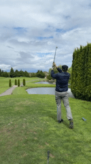 Evening golf session captured at Richmond course with scenic features