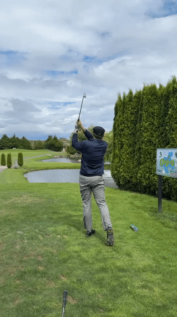 Evening golf session captured at Richmond course with scenic features