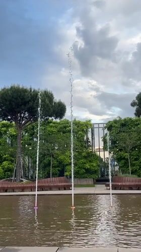 Boy plays in Krasnodar park amid fountains and art installations