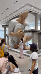 Inside a Shenzhen art and retail complex with bold large-scale work