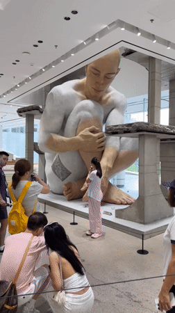 Inside a Shenzhen art and retail complex with bold large-scale work