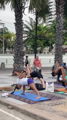 Late-night beach yoga class held in Pattaya, Thailand