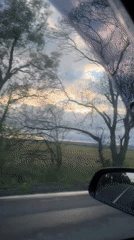 Car travels rural road near Burgas under cloudy skies