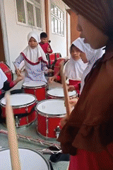 School marching band rehearsal in Baratpayaitek, Indonesia