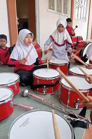 School marching band rehearsal in Baratpayaitek, Indonesia