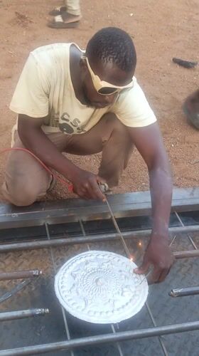 Artisans create metalwork and display decorative beads in Akwanga