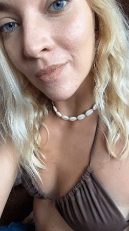 Woman records selfie videos in rural Belarus wearing bikini