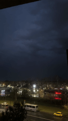 Nighttime balcony observations document stormy evening in Łódź, Poland