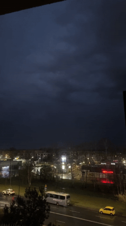 Nighttime balcony observations document stormy evening in Łódź, Poland