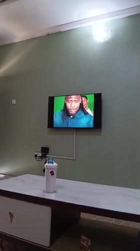 TV viewing session recorded in Nigerian residential space