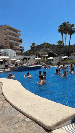 Poolside relaxing and water aerobics on a Mallorcan morning