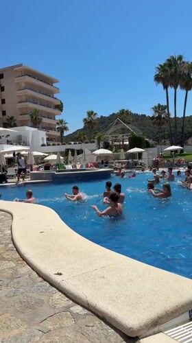 Poolside relaxing and water aerobics on a Mallorcan morning