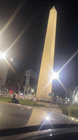 Night drive captures Buenos Aires landmarks in pink illumination