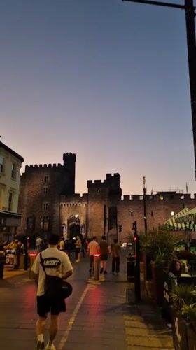 Cardiff Castle draws evening crowds during twilight hours