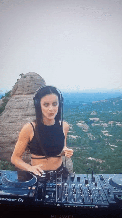 Woman DJs outdoor set in Novokuybyshevsk with Pioneer equipment