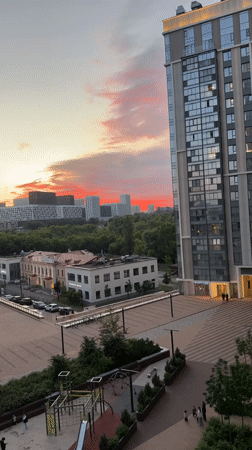 Urban sunset with apartment building and golden light