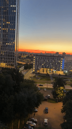 City skyline at sunset, aerial and balcony perspectives