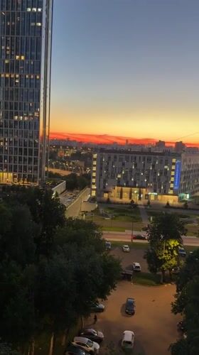 City skyline at sunset, aerial and balcony perspectives