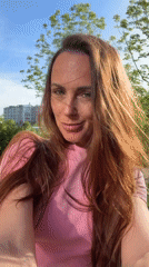 Woman takes selfies around Birobidzhan during morning photo session