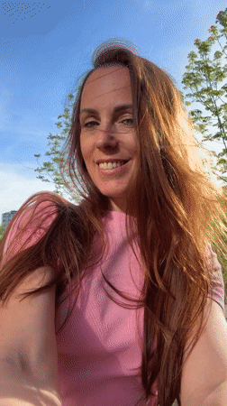 Woman takes selfies around Birobidzhan during morning photo session