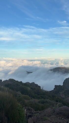 Clear mountain vista captured above cloud layer in Santana