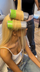 London salon uses beverage cans as hair rollers