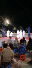 Band in white suits performs for crowd in Nha Trang