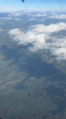 Aerial countryside view and weathered window captured in Zemun