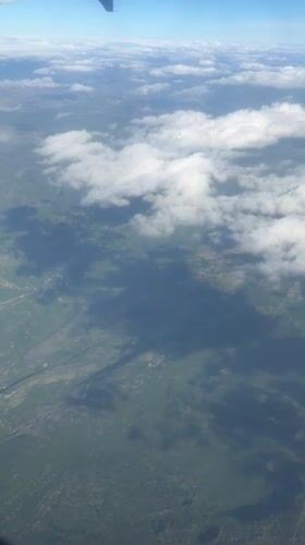 Aerial countryside view and weathered window captured in Zemun