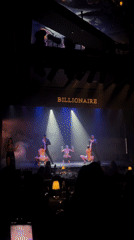 Stage performance with singer and dancers at Dubai's Billionaire venue