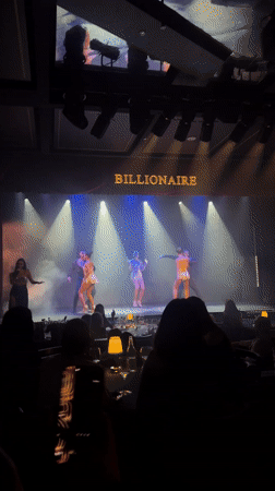 Stage performance with singer and dancers at Dubai's Billionaire venue