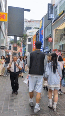 Morning street life unfolds in busy Seoul commercial district
