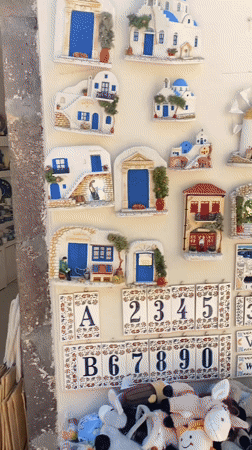 Strolling past blue doors and bougainvillea in Santorini's Oia
