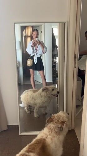 Woman documents wedding dress fitting, daily life in Budva