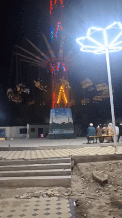 Evening carnival activities captured at Khujand amusement park