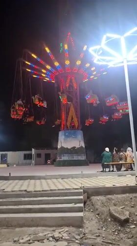 Evening carnival activities captured at Khujand amusement park