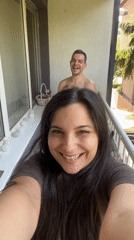 Couple shares morning coffee moment on Sofia balcony