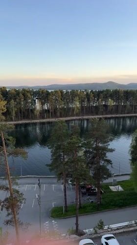 Panoramic views captured of Lake Turgoyak, Russia during afternoon