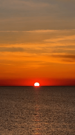 Vivid sunset captured over ocean waters in Ukraine