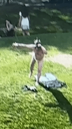 Person in underwear stands with outstretched arms in Khimki