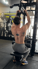 Man performs lat pulldowns at Tsarevo gym