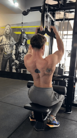 Man performs lat pulldowns at Tsarevo gym